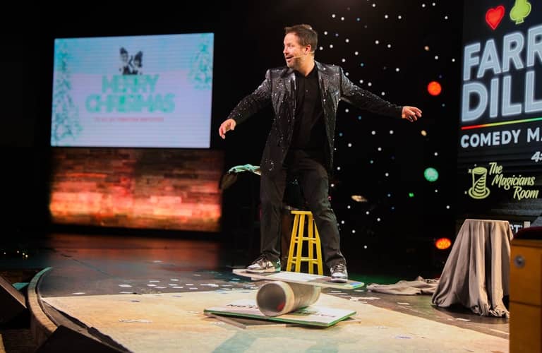 Farrell Dillon performing his straitjacket escape on stage