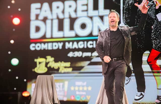Farrell Dillon performing comedy magic on stage